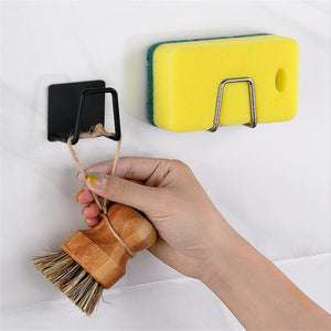 https://www.kitchenswags.com/cdn/shop/products/Kitchen-Stainless-Steel-Sink-Sponges-Holder-Self-Adhesive-Drain-Drying-Rack-Kitchen-Wall-Hooks-Accessories-Storage_9016a6c7-4a85-4818-a695-0963f6d9e1f3_300x.jpg?v=1667978712